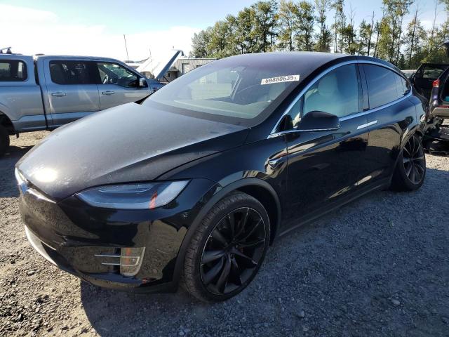 TESLA MODEL X 2018 with VIN 5YJXCBE43JF125929 - Photo from auction