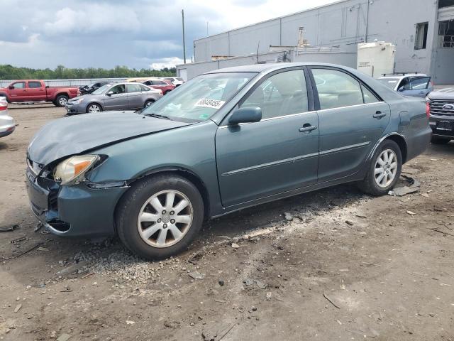 TOYOTA CAMRY LE 2003 with VIN 4T1BE30K13U713088 - Photo from auction