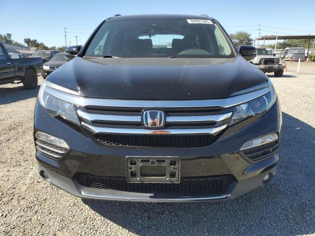 Photo 5 from auction – 2017 HONDA PILOT TOURING with VIN 5FNYF6H98HB097288