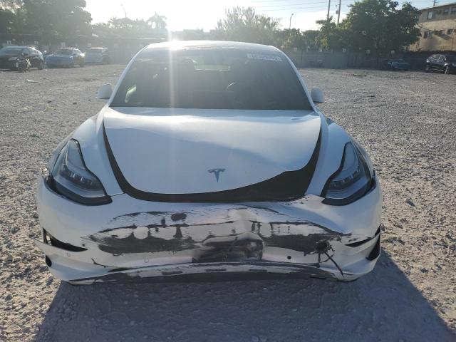 Photo 5 from auction – 2020 TESLA MODEL 3 with VIN 5YJ3E1EA3LF703684