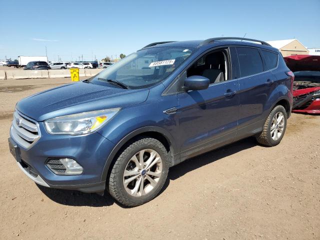 Photo 1 from auction – 2018 FORD ESCAPE SE with VIN 1FMCU9GD7JUB12847