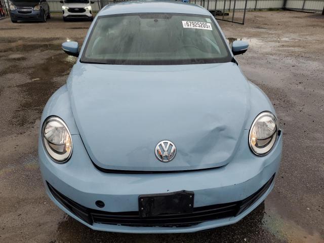 Photo 5 from auction – 2014 VOLKSWAGEN BEETLE with VIN 3VWJX7AT0EM632760