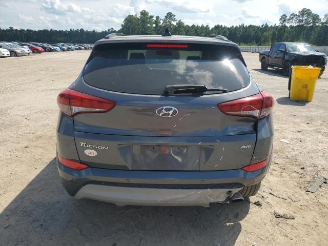 Photo 6 from auction – 2018 HYUNDAI TUCSON VALUE with VIN KM8J3CA22JU761907