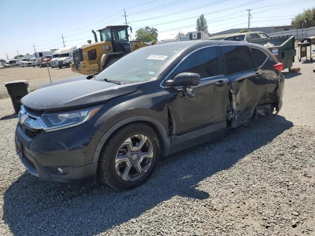 HONDA CR-V EX 2018 with VIN 7FARW1H52JE034007 - Photo from auction
