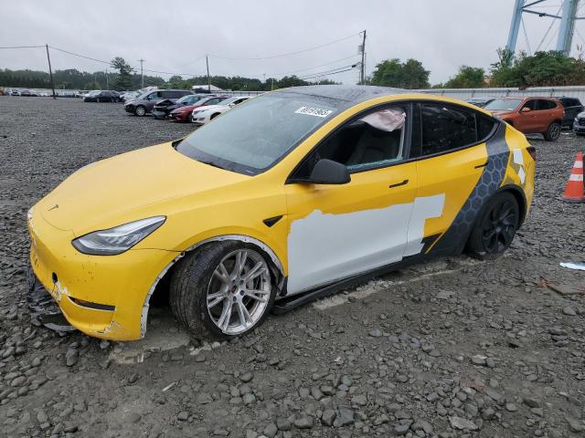 TESLA MODEL Y 2022 with VIN 7SAYGDEE2NA012069 - Photo from auction