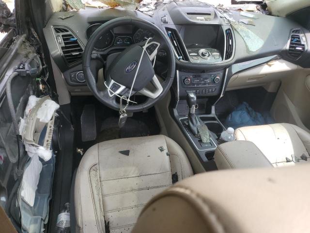 Photo 8 from auction – 2017 FORD ESCAPE TITANIUM with VIN 1FMCU0J9XHUE25899