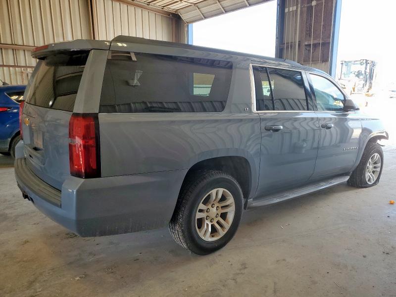 Photo 3 from auction – 2016 CHEVROLET SUBURBAN C1500 LT with VIN 1GNSCHKC3GR229470