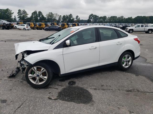 FORD FOCUS SE 2014 with VIN 1FADP3F20EL249207 - Photo from auction