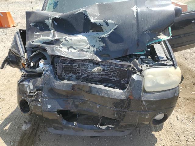Photo 12 from auction – 2007 FORD ESCAPE LIM with VIN 1FMCU04197KA21668