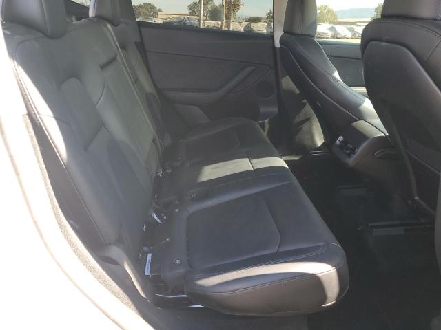Photo 11 from auction – 2023 TESLA MODEL Y with VIN 7SAYGDEF8PF815693