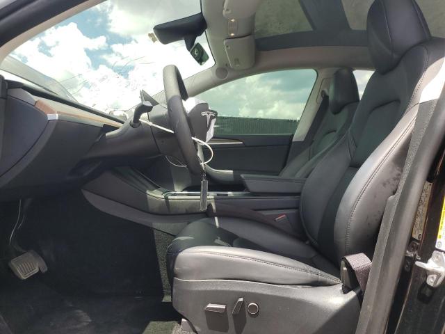 Photo 7 from auction – 2023 TESLA MODEL Y with VIN 7SAYGDEE7PF750200