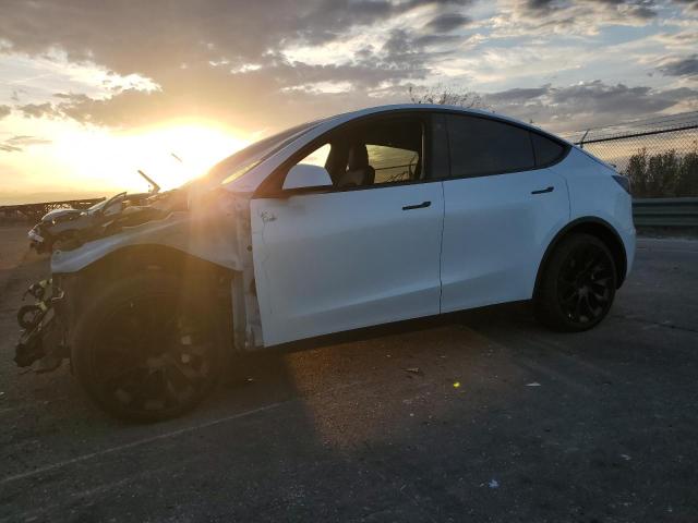 TESLA MODEL Y 2022 with VIN 7SAYGDEE0NF385601 - Photo from auction