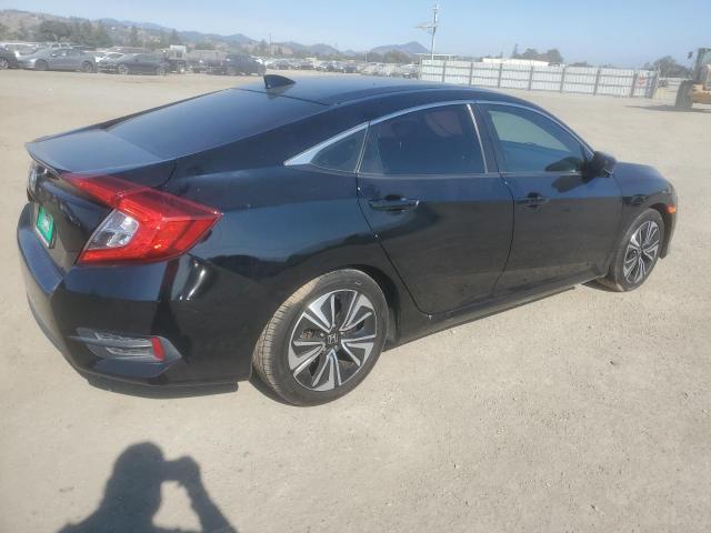 Photo 3 from auction – 2018 HONDA CIVIC EX with VIN JHMFC1F30JX040949
