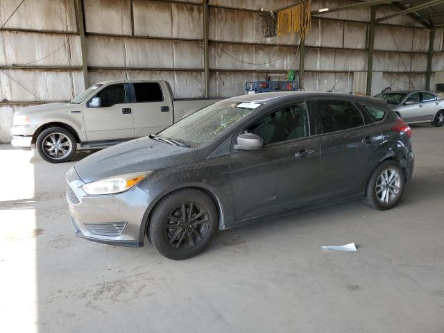 FORD FOCUS SE 2018 with VIN 1FADP3K24JL271131 - Photo from auction