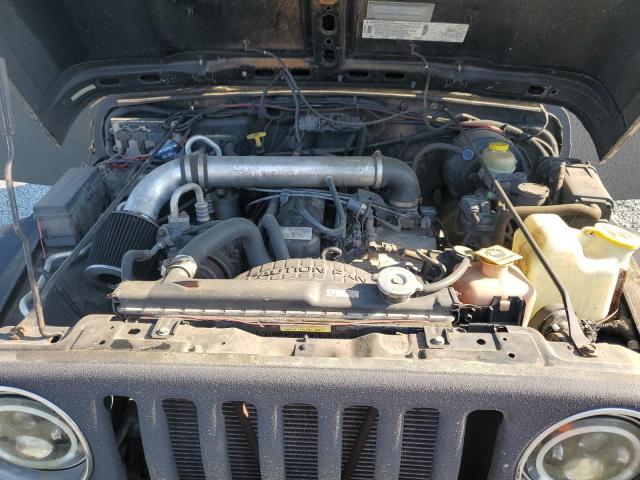 Photo 11 from auction – 1999 JEEP 4X4LIMITED with VIN 1J4FY19S6XP407622