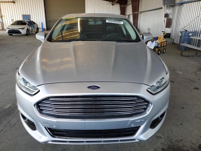 Photo 5 from auction – 2014 FORD FUSION TITANIUM HEV with VIN 3FA6P0RU6ER220672