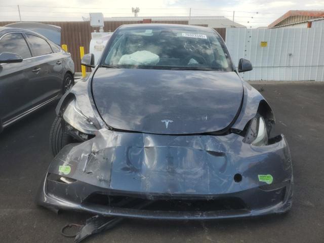 Photo 5 from auction – 2023 TESLA MODEL Y with VIN 7SAYGDEE2PF639103
