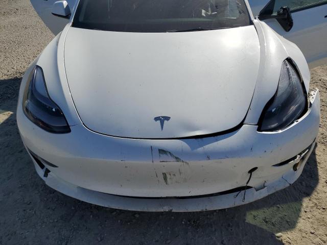 Photo 11 from auction – 2023 TESLA MODEL 3 with VIN 5YJ3E1EA2PF589702