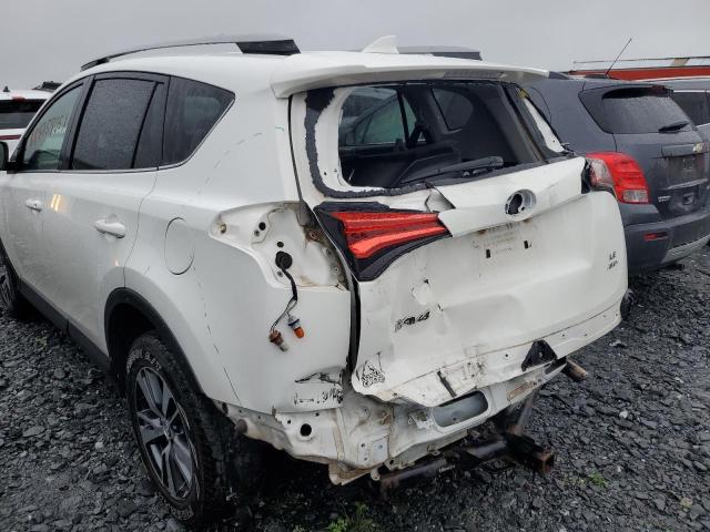 Photo 13 from auction – 2018 TOYOTA RAV4 LE with VIN 2T3BFREVXJW822060
