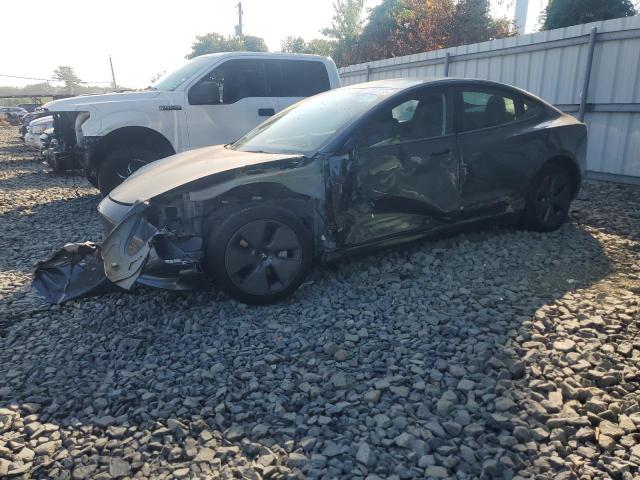 TESLA MODEL 3 2023 with VIN 5YJ3E1EA4PF700217 - Photo from auction