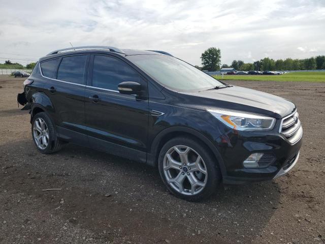 Photo 4 from auction – 2017 FORD ESCAPE TIT with VIN 1FMCU0J90HUE30321