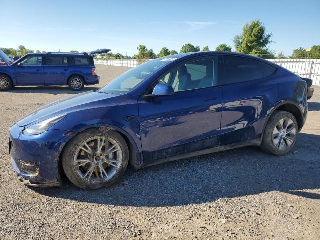 TESLA MODEL Y 2023 with VIN LRWYGDEE2PC136887 - Photo from auction