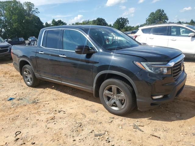 Photo 4 from auction – 2023 HONDA RIDGELINE with VIN 5FPYK3F70PB005494