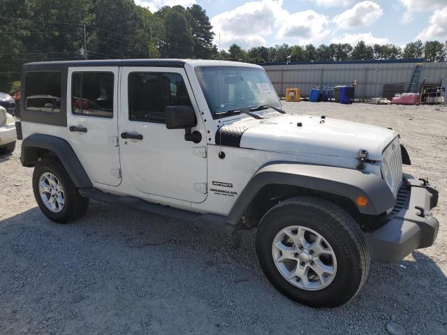 Photo 4 from auction – 2016 JEEP WRANGLER U with VIN 1C4BJWDG3GL327470