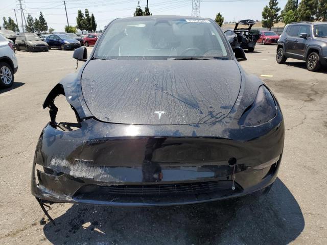 Photo 5 from auction – 2023 TESLA MODEL Y with VIN 7SAYGAEE3PF843052