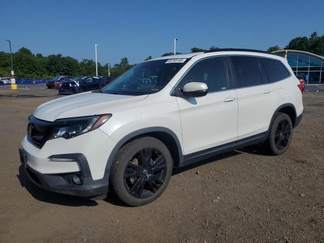 HONDA PILOT SE 2021 with VIN 5FNYF6H25MB067548 - Photo from auction