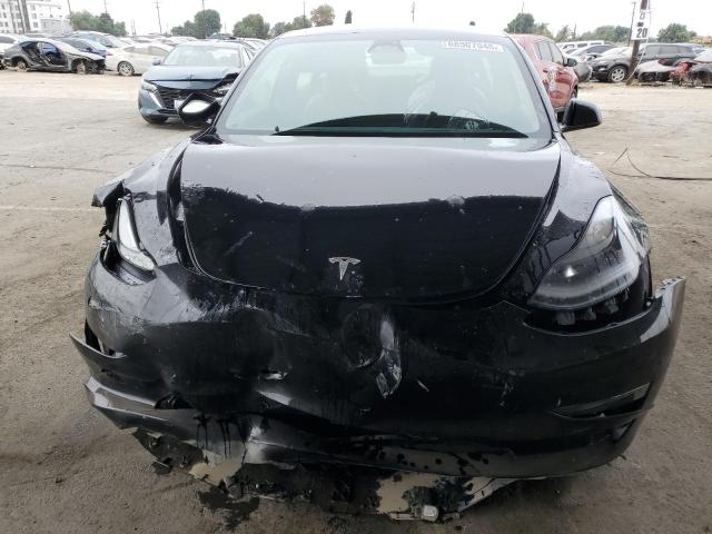 Photo 5 from auction – 2023 TESLA MODEL 3 with VIN 5YJ3E1EAXPF576695