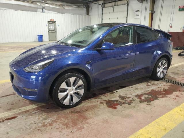 TESLA MODEL Y 2023 with VIN 7SAYGAEE1PF972312 - Photo from auction