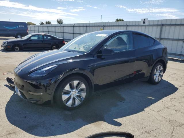 TESLA MODEL Y 2023 with VIN 7SAYGAEE3PF903721 - Photo from auction