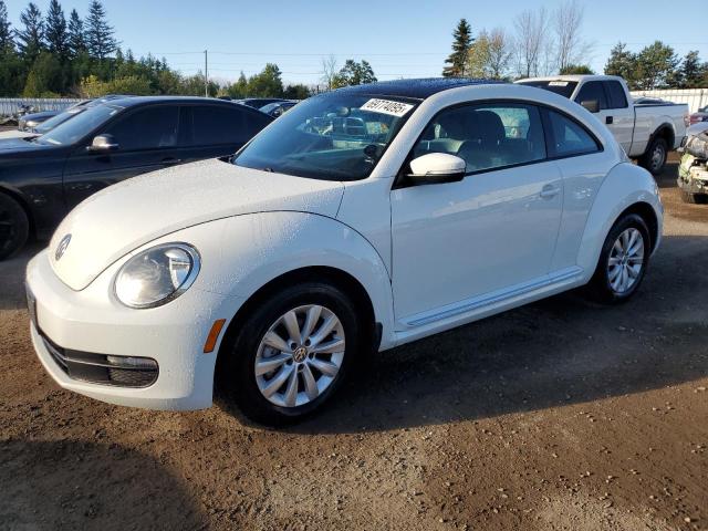 Photo 1 from auction – 2014 VOLKSWAGEN BEETLE with VIN 3VWJL7ATXEM640246