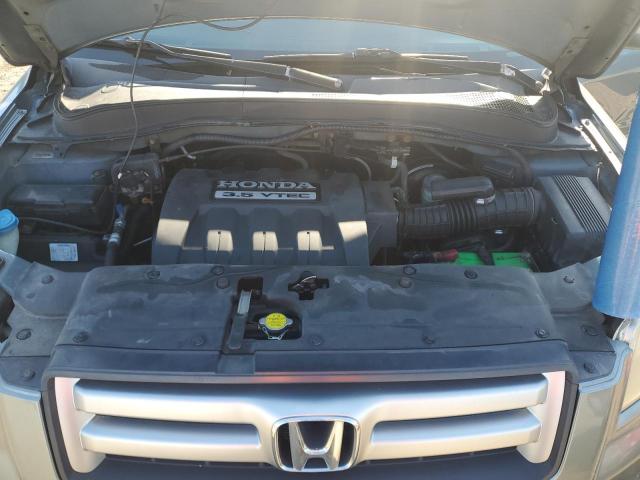 Photo 12 from auction – 2006 HONDA PILOT EX with VIN 2HKYF18526H001881