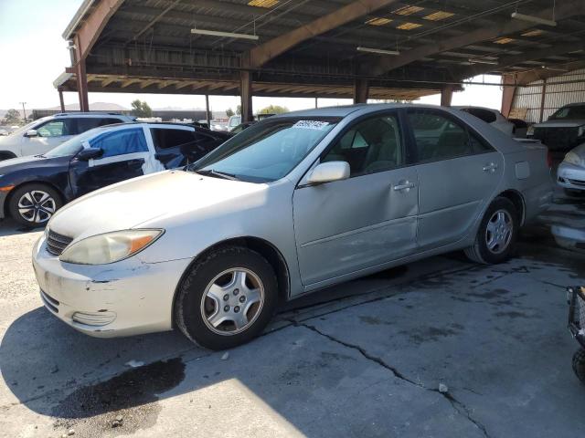 TOYOTA CAMRY LE 2003 with VIN 4T1BF32K03U560231 - Photo from auction