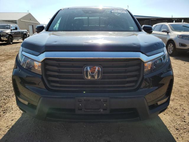 Photo 5 from auction – 2023 HONDA RIDGELINE with VIN 5FPYK3F52PB015913