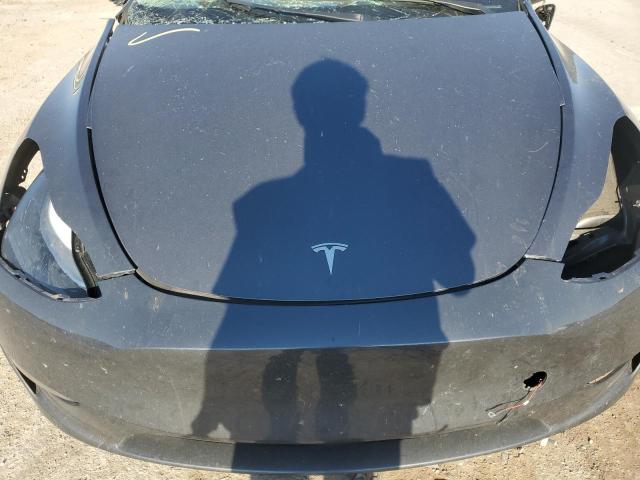 Photo 11 from auction – 2023 TESLA MODEL Y with VIN 7SAYGDEE3PF803684