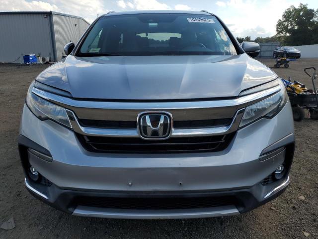 Photo 5 from auction – 2021 HONDA PILOT TOUR with VIN 5FNYF6H91MB014245