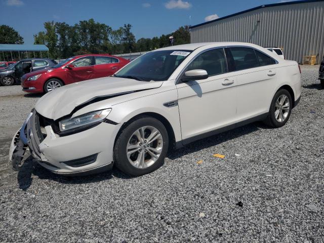 FORD TAURUS SEL 2014 with VIN 1FAHP2E83EG128536 - Photo from auction