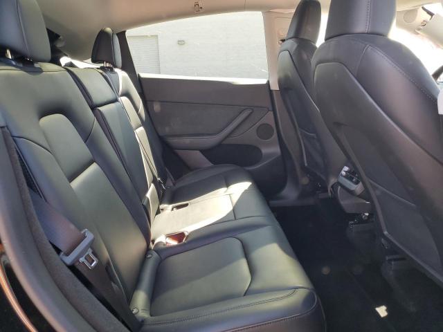 Photo 11 from auction – 2023 TESLA MODEL Y with VIN 7SAYGDEE4PA098083