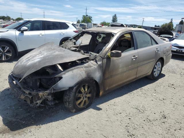TOYOTA CAMRY LE 2003 with VIN JTDBE30K730171233 - Photo from auction