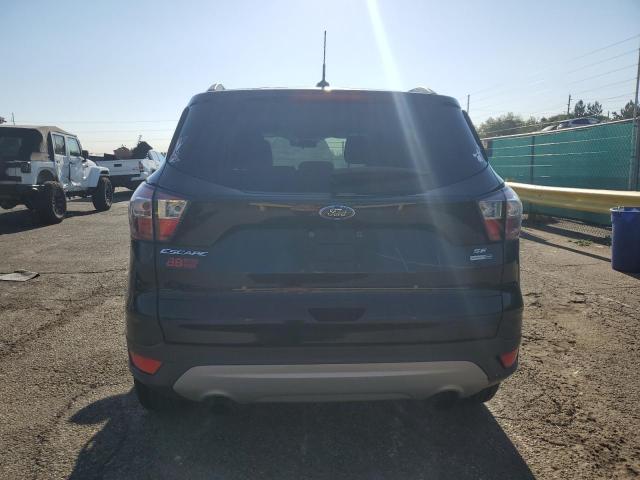 Photo 6 from auction – 2018 FORD ESCAPE SE with VIN 1FMCU9GD8JUA86954