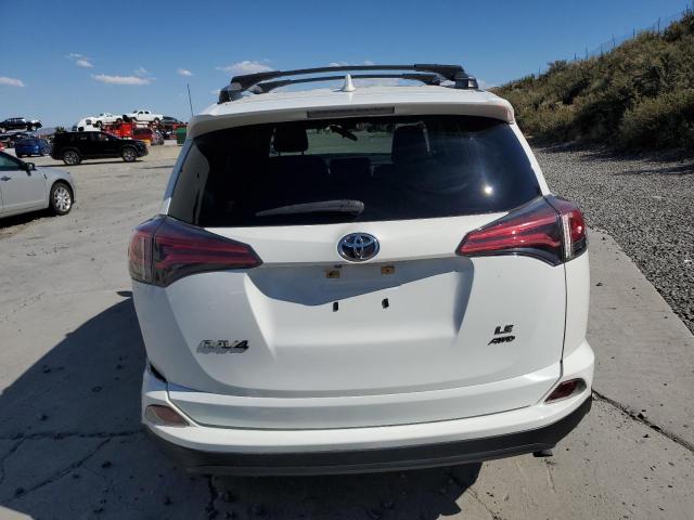 Photo 6 from auction – 2018 TOYOTA RAV4 LE with VIN JTMBFREV4JJ253589