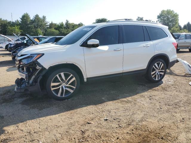 HONDA PILOT ELIT 2017 with VIN 5FNYF6H08HB094697 - Photo from auction