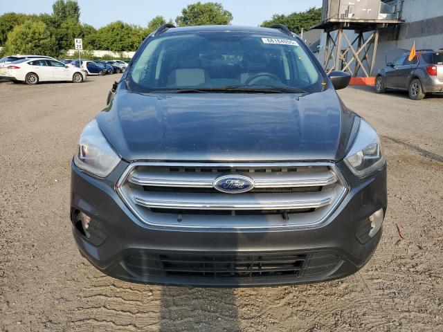 Photo 5 from auction – 2017 FORD ESCAPE SE with VIN 1FMCU9GD1HUC94071