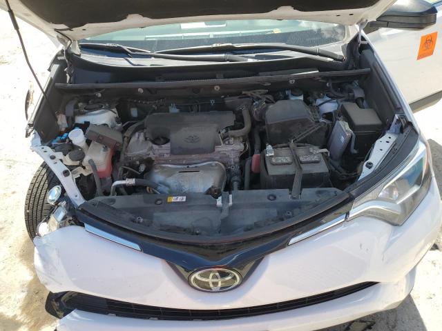 Photo 12 from auction – 2018 TOYOTA RAV4 LE with VIN 2T3BFREV0JW856508