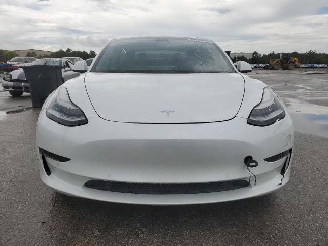 Photo 5 from auction – 2021 TESLA MODEL 3 with VIN 5YJ3E1EA8MF857860