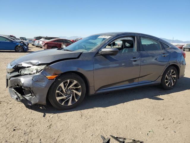 HONDA CIVIC EX 2016 with VIN 2HGFC2F7XGH566448 - Photo from auction