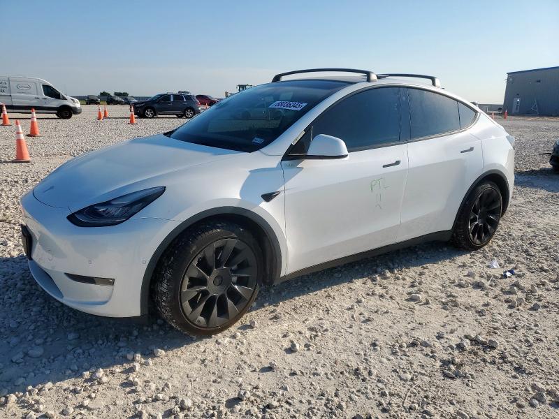 TESLA MODEL Y 2021 with VIN 5YJYGAEE1MF214656 - Photo from auction